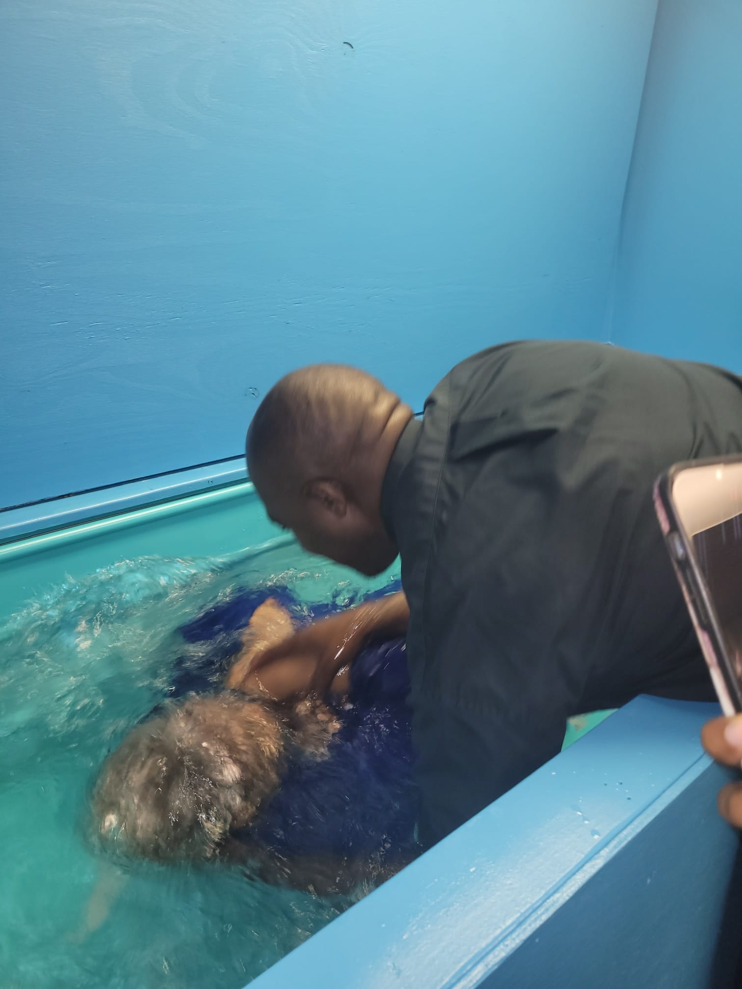 Baptism service at One Family in Christ Church
